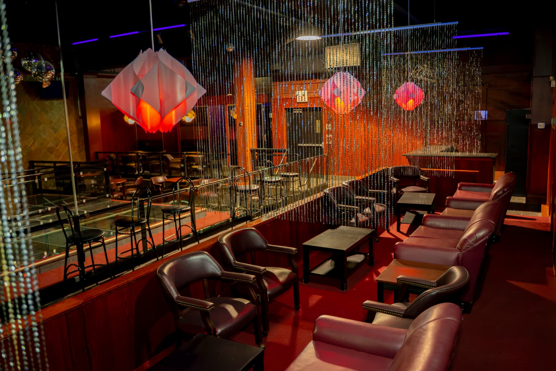 Cactus Jaxx VIP lounge with leather seating and hanging fixtures