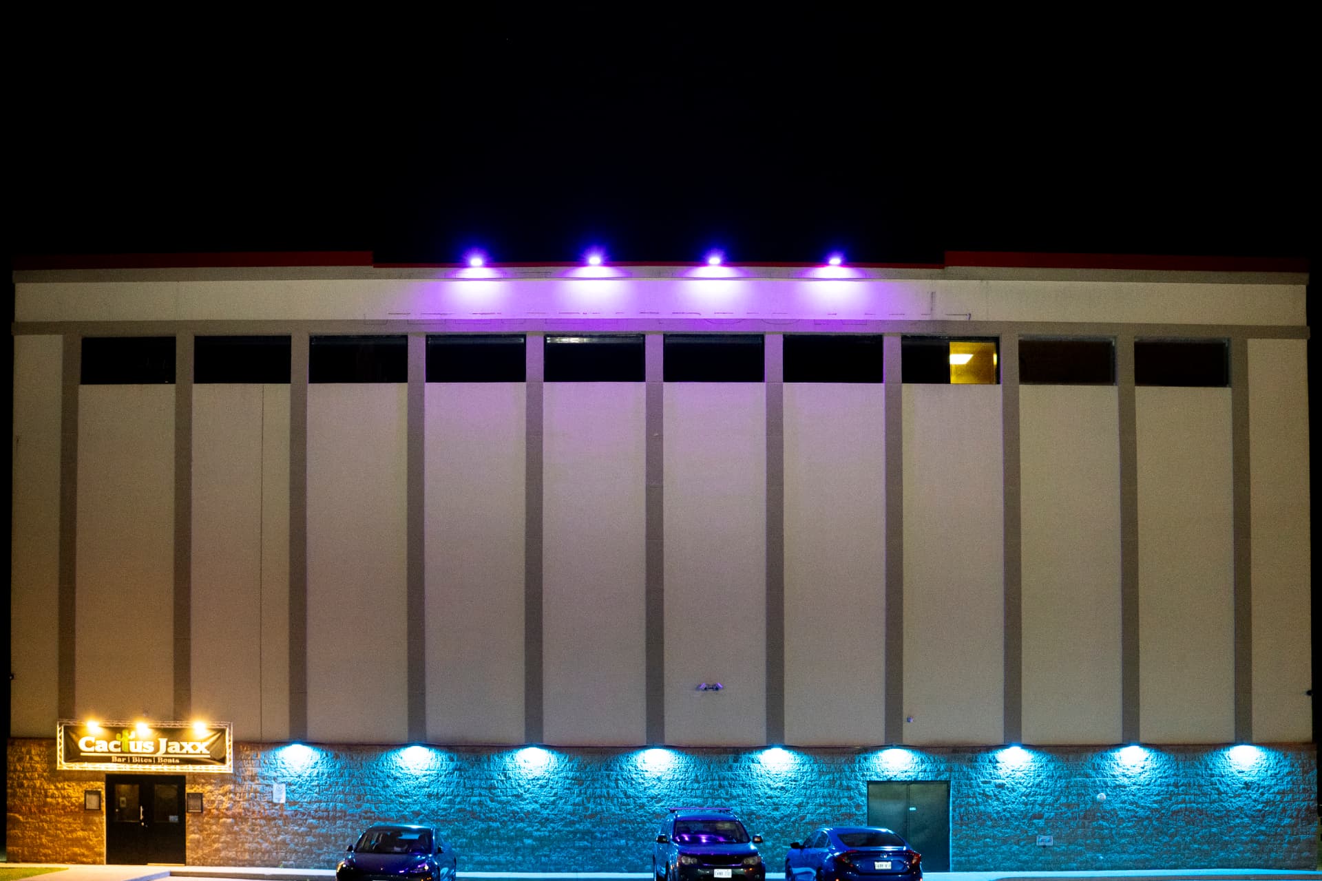 Cactus Jaxx Cambridge exterior at night with illuminated entrance