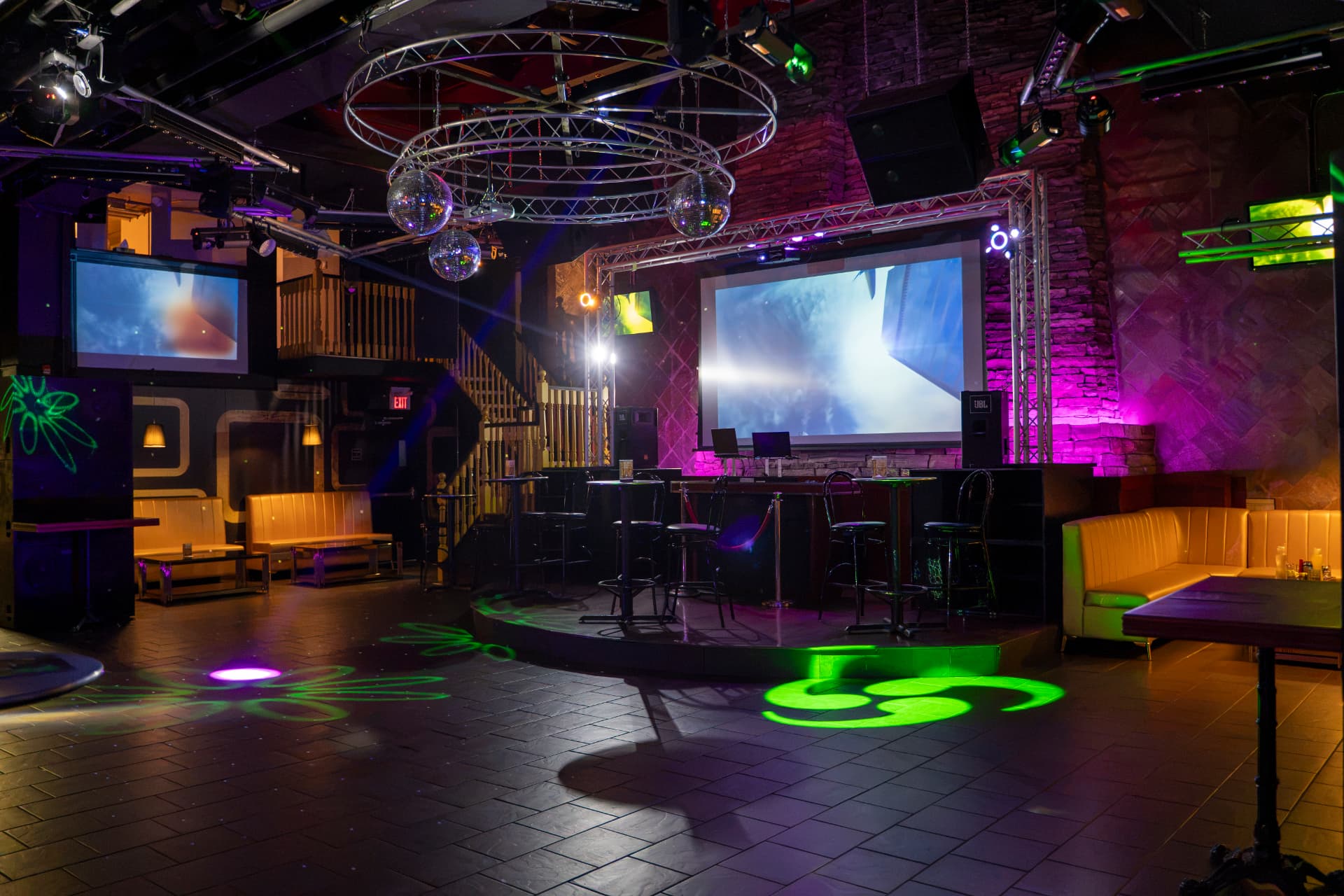 Cactus Jaxx performance stage and dance floor with screens and club lighting