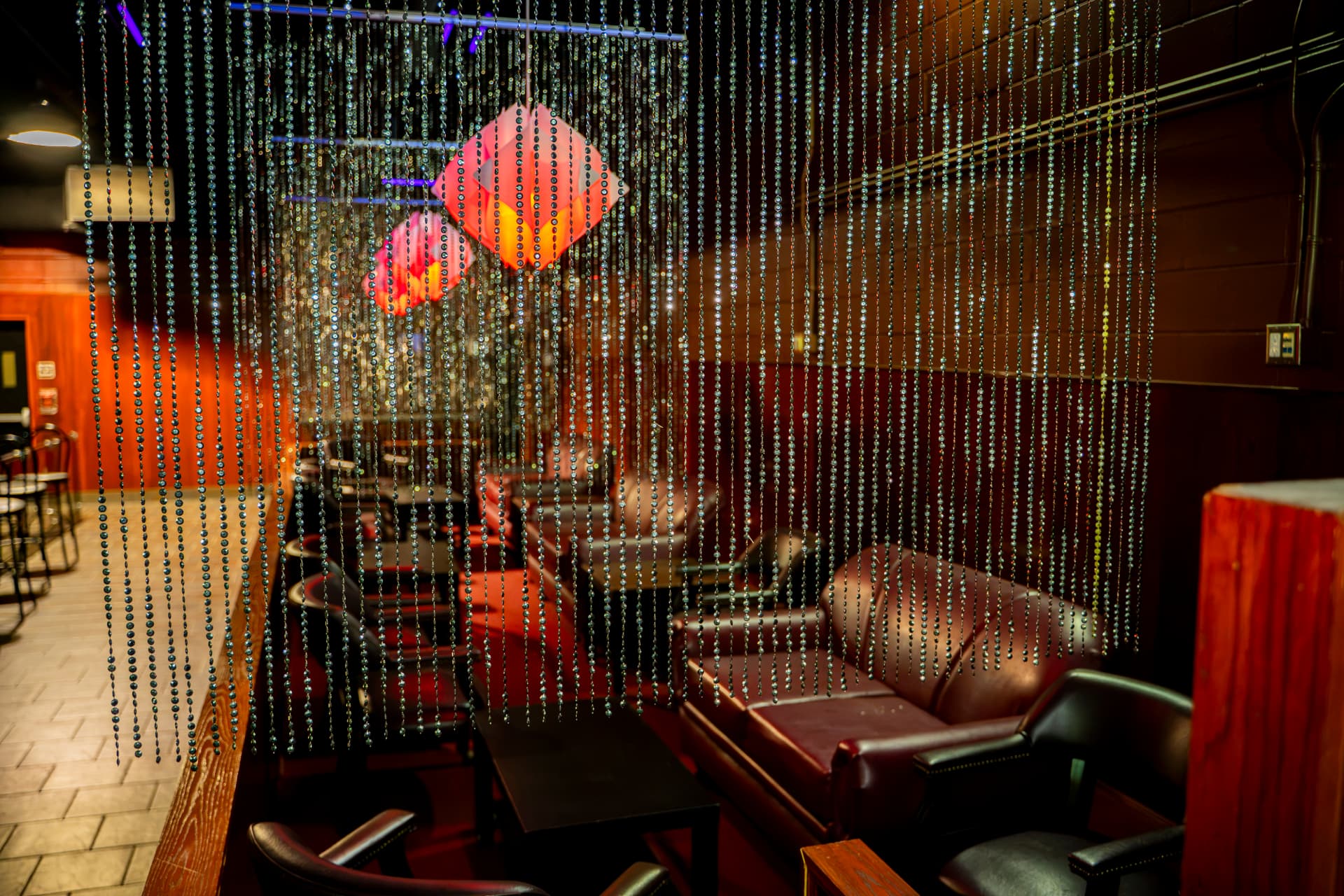 Intimate Cactus Jaxx lounge behind shimmering beaded curtains
