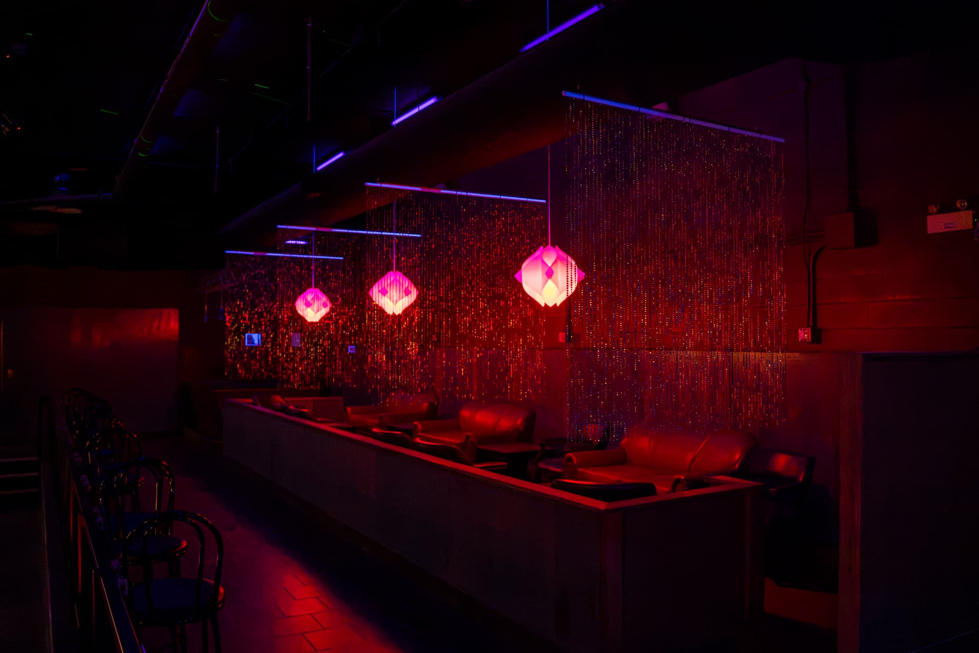 Private red-lit lounge seating at Cactus Jaxx Cambridge